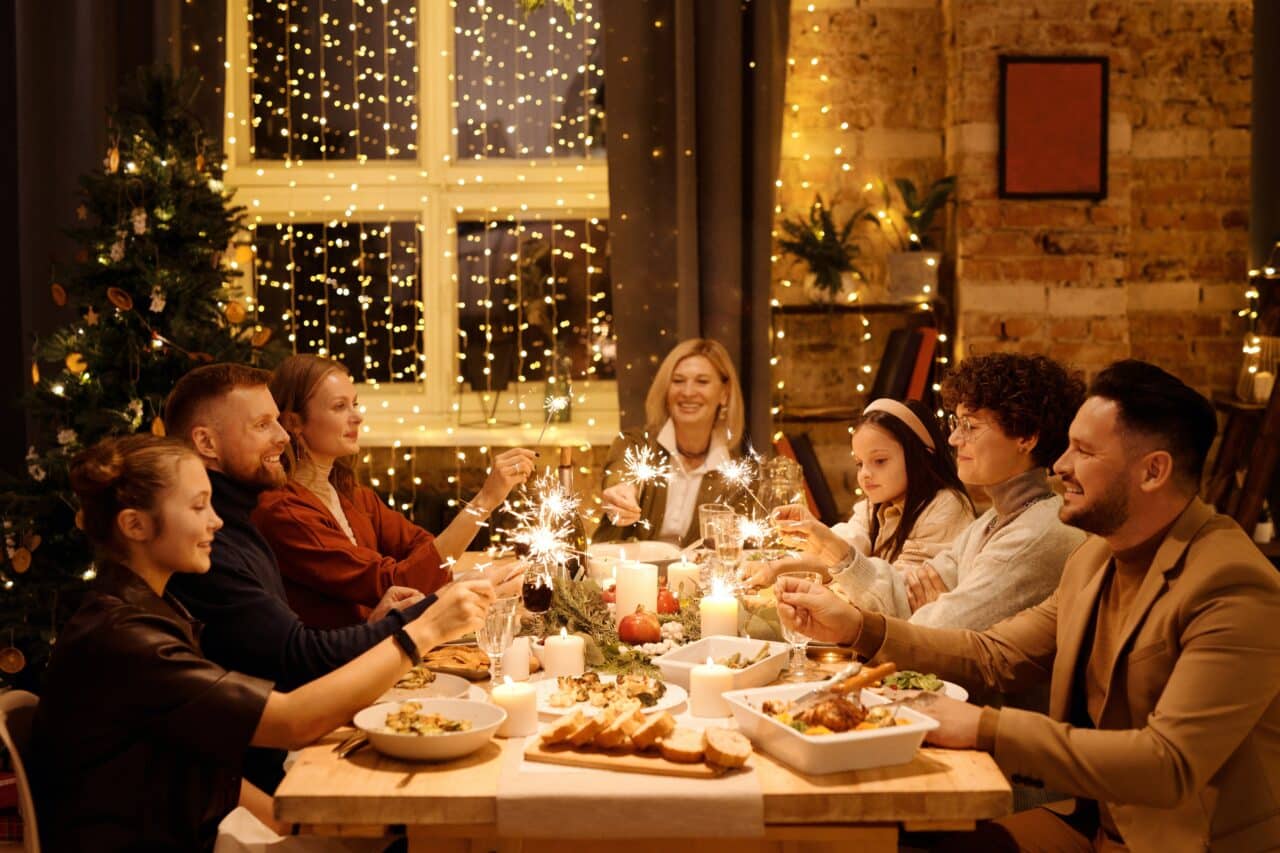 Large family enjoying a festive holiday dinner.
