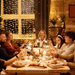 Large family enjoying a festive holiday dinner.