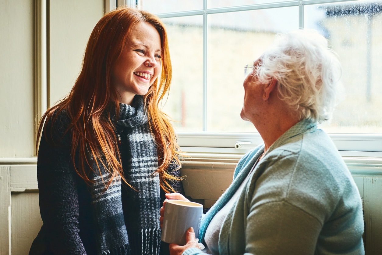 Young woman talking to her mother.